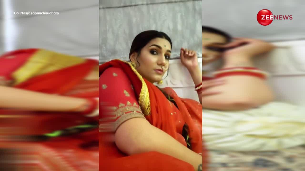 Sapna Chaudhary का वायरल हुआ महारानी लुक, कांजीवरम साड़ी और नौलखा हार पहन सोफे पर दिखीं इतराती