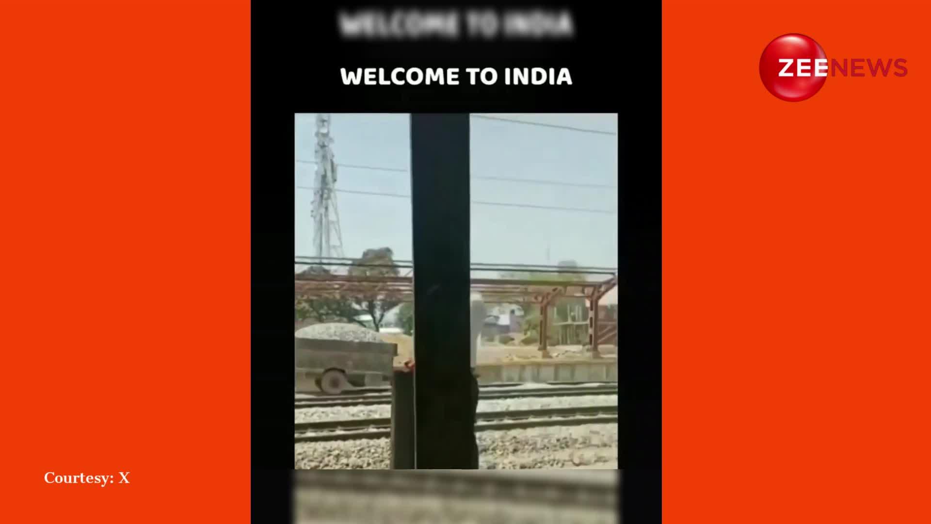 ट्रैक्टर को रेल की पटरियों पर दौड़ाता दिखा शख्स, देख लोग बोले- इंडिया में आपका स्वागत है!