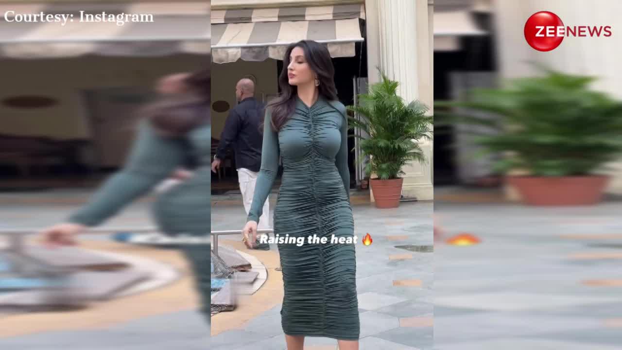ग्रीन बॉडीकॉन ड्रेस और लहराते बालों में नजर आईं Nora Fatehi, वीडियो हुआ वायरल