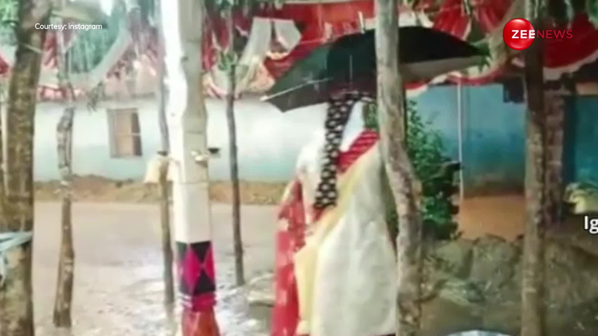 झमाझम बारिश में भी छाता लेकर फेरे लेते हुए नजर आए दूल्हा दुल्हन, वीडियो देख आंटी बोलीं- और खाओ कड़ाई में मैगी