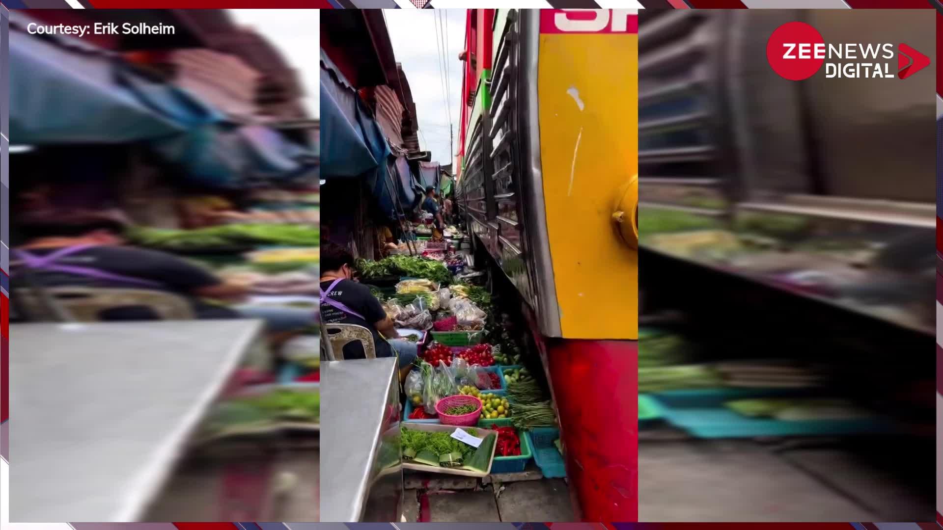 Viral Video: खतरे से खेल रहे लोग! रेलवे ट्रैक पर लगा बाजार, ऊपर से गुजरती ट्रेन....